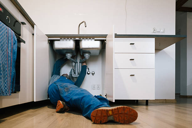 Professional Emergency Plumber technician working in Five Points, FL